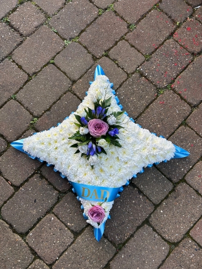 Funeral cushion flower arrangement