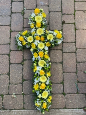 Cross funeral flower tribute