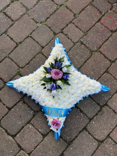 Funeral cushion flower arrangement