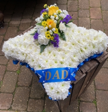 Funeral cushion flower arrangement